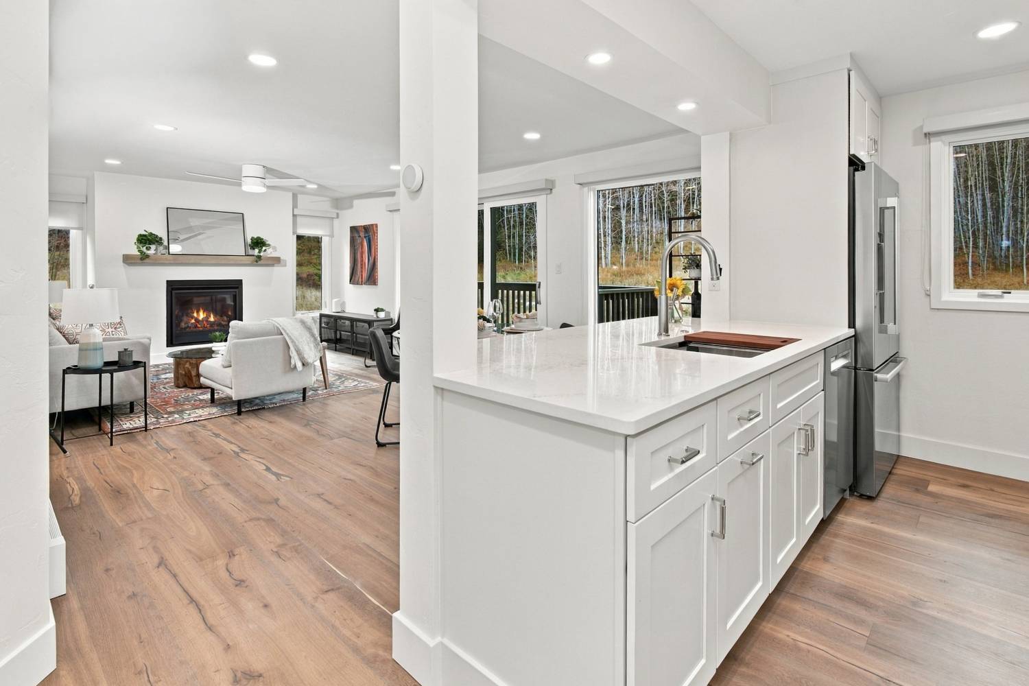 Kitchen peninsula opening to the living room