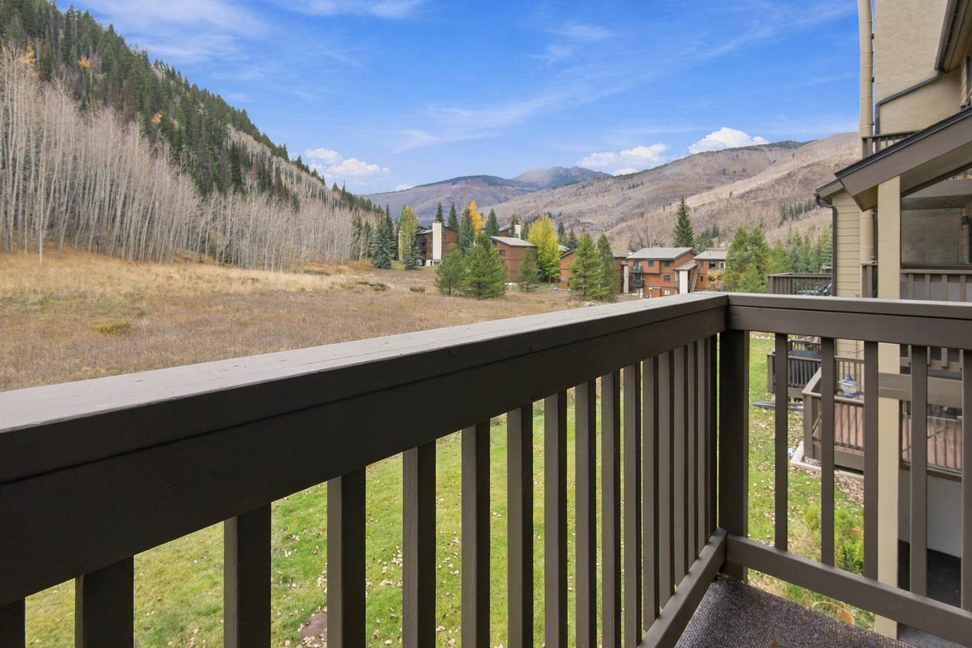 Deck with valley and mountain views